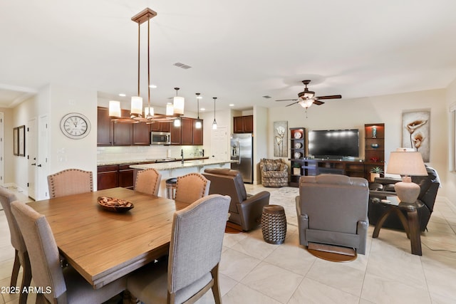 dining space with recessed lighting, light tile patterned flooring, a ceiling fan, and visible vents