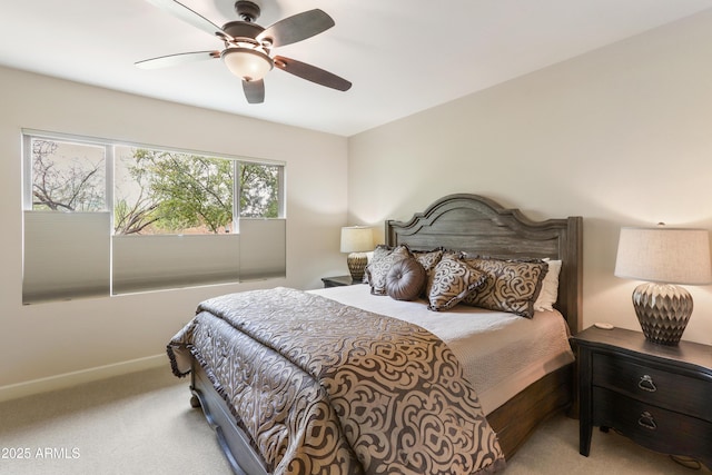 bedroom featuring baseboards, carpet, and ceiling fan