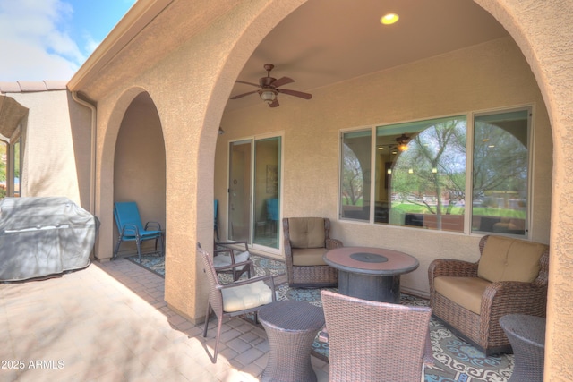 view of patio with ceiling fan