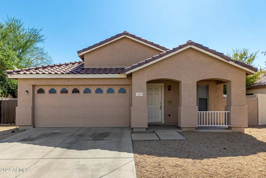 view of front of property featuring a garage