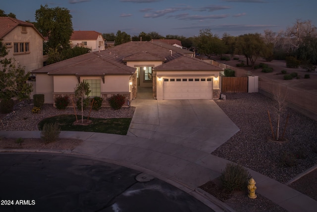 view of front of property featuring a garage