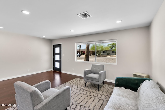 1911 E Lawrence Rd, Phoenix, AZ 85016 - living room featuring wood finished floors and recessed lighting