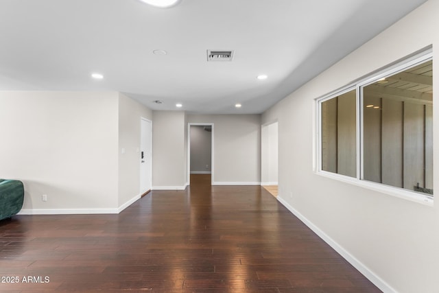 1911 E Lawrence Rd, Phoenix, AZ 85016 - spare room featuring hardwood / wood-style floors and recessed lighting