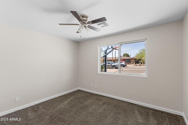 1911 E Lawrence Rd, Phoenix, AZ 85016 - spare room featuring dark carpet and a ceiling fan