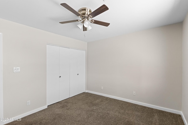 1911 E Lawrence Rd, Phoenix, AZ 85016 - unfurnished bedroom featuring dark colored carpet, a closet, and ceiling fan