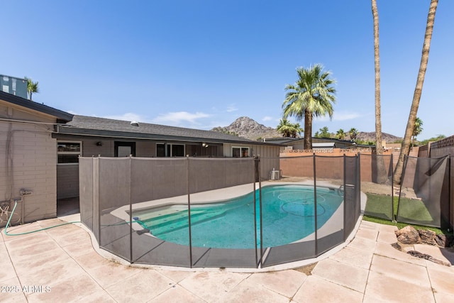 1911 E Lawrence Rd, Phoenix, AZ 85016 - view of swimming pool featuring a fenced backyard, a mountain view, and a patio area