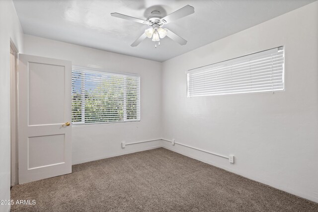 5709 N 16th St, Phoenix, AZ 85016 - spare room featuring carpet and a ceiling fan