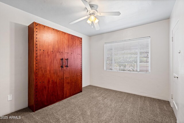 5709 N 16th St, Phoenix, AZ 85016 - unfurnished bedroom with a closet, carpet flooring, and ceiling fan