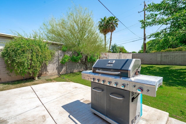 5709 N 16th St, Phoenix, AZ 85016 - view of patio / terrace with a fenced backyard and a grill