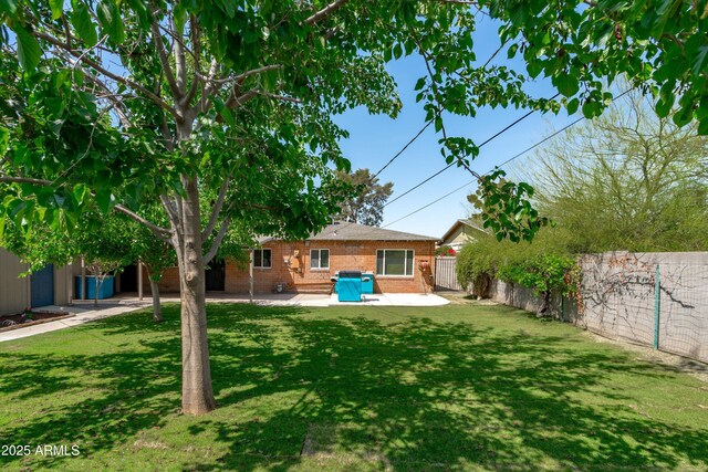 5709 N 16th St, Phoenix, AZ 85016 - view of yard featuring a patio area and a fenced backyard