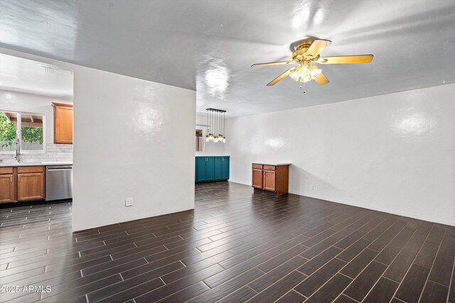 5709 N 16th St, Phoenix, AZ 85016 - unfurnished living room with wood finished floors, ceiling fan, and a sink