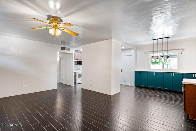 5709 N 16th St, Phoenix, AZ 85016 - unfurnished living room featuring dark wood-type flooring, visible vents, and a ceiling fan