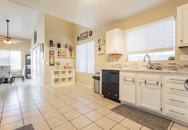 kitchen with dishwasher, ceiling fan, a healthy amount of sunlight, and white cabinetry