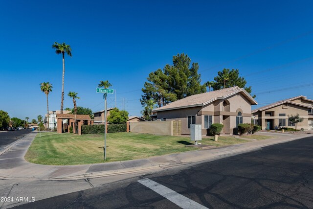 view of front of property with a front lawn