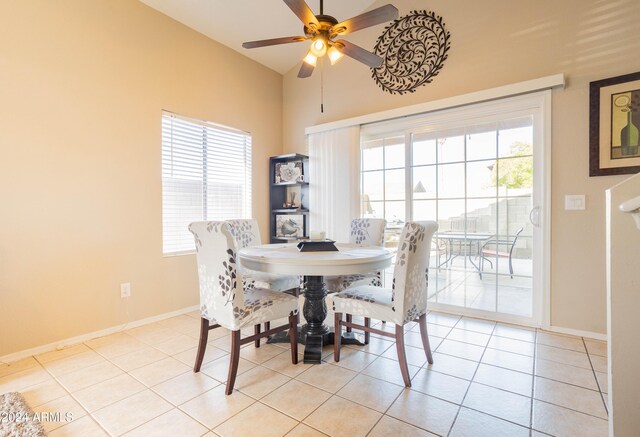 dining area with ceiling fan and light tile patterned floors