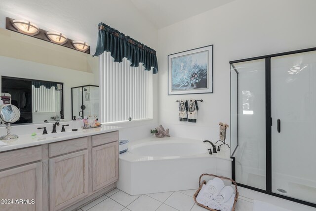 bathroom featuring vanity, separate shower and tub, and tile patterned floors