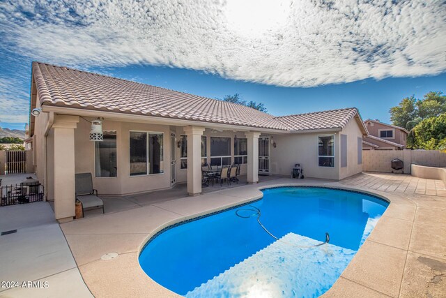 view of pool featuring a patio