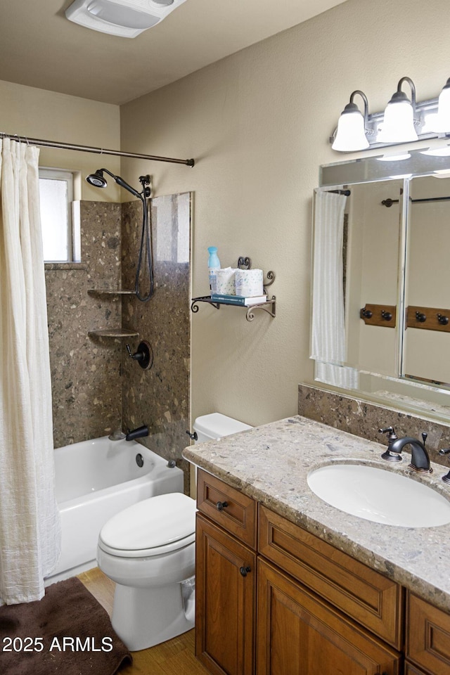 full bathroom with toilet, vanity, and shower / bath combo