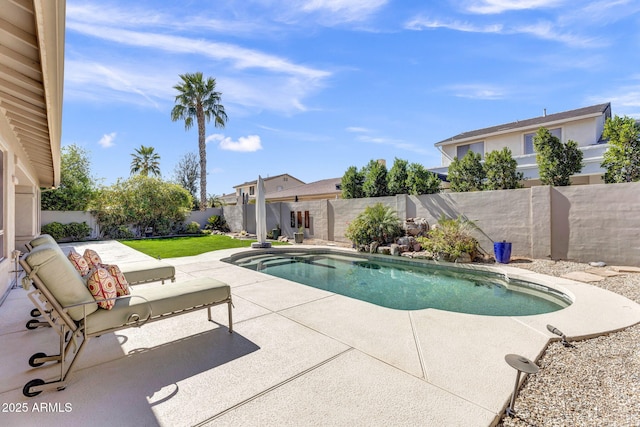 view of pool with a fenced in pool, a patio area, and a fenced backyard