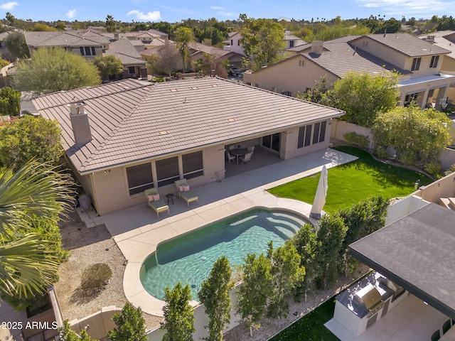 drone / aerial view with a residential view