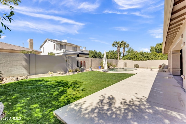 view of yard featuring a patio area, a fenced backyard, and a fenced in pool