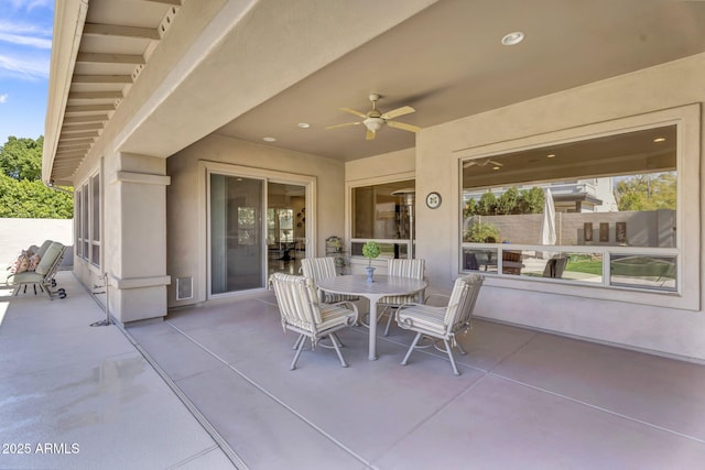 view of patio / terrace featuring ceiling fan and outdoor dining space