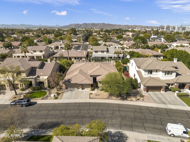 bird's eye view featuring a mountain view and a residential view