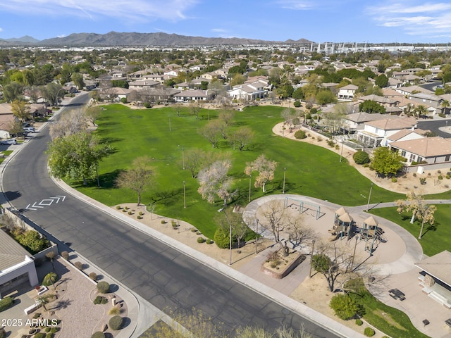 birds eye view of property with a residential view and a mountain view