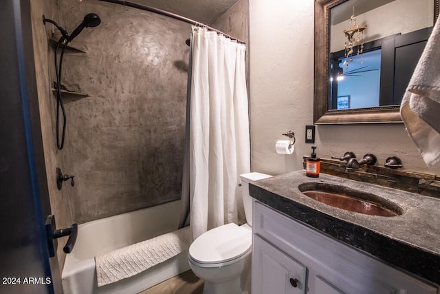 full bathroom featuring vanity, shower / tub combo with curtain, and toilet