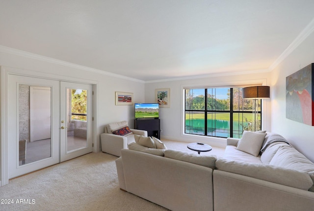 living area with ornamental molding, french doors, and light carpet