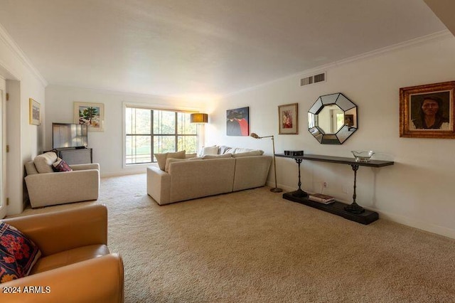 living room with carpet flooring and ornamental molding