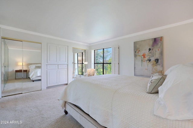 bedroom with ornamental molding and light carpet