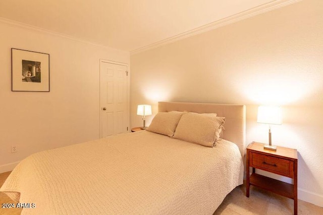 bedroom featuring ornamental molding