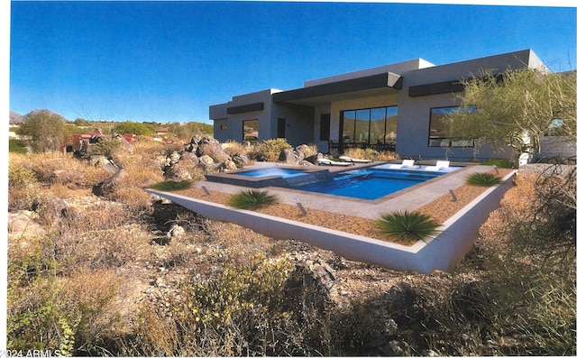 view of swimming pool featuring an in ground hot tub and a diving board