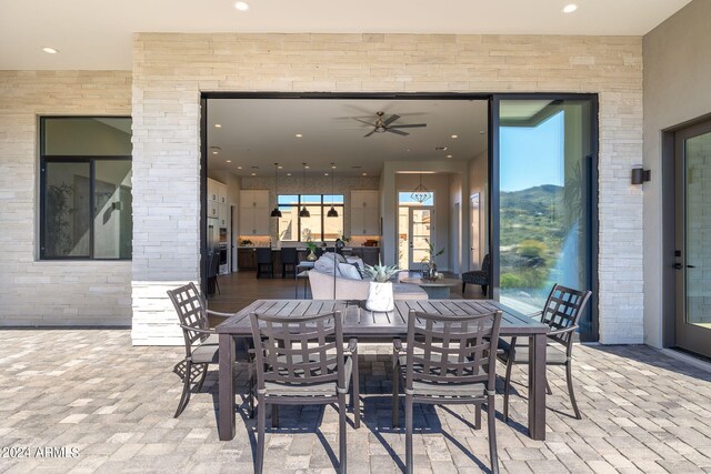 view of patio with ceiling fan