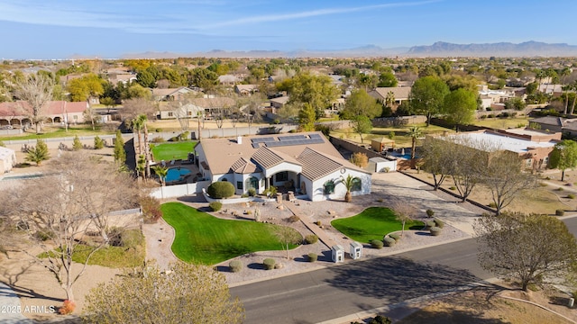 drone / aerial view featuring a mountain view and a residential view