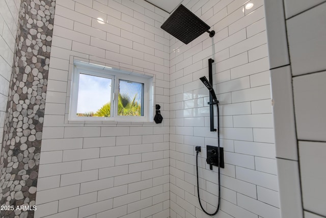 full bath featuring tiled shower