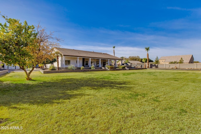 view of yard featuring fence