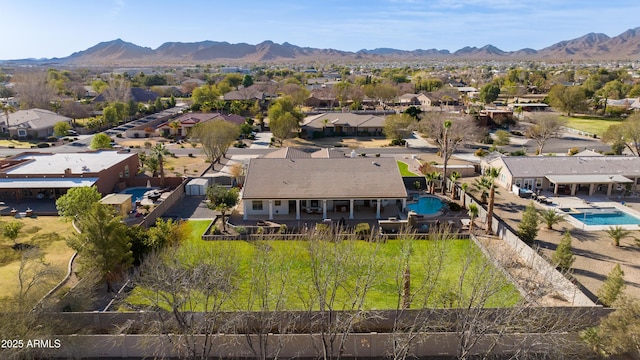 bird's eye view featuring a residential view and a mountain view