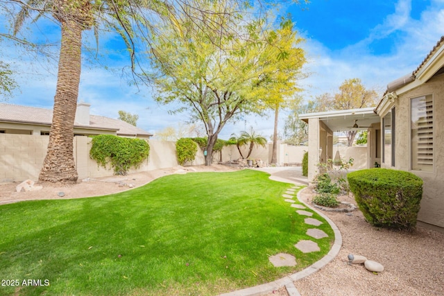 view of yard featuring a fenced backyard