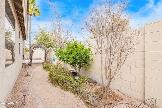 view of yard featuring fence