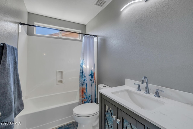 12720 W Cantenia Rd, Avondale, AZ 85392 - bathroom with shower / tub combo, a textured wall, and vanity