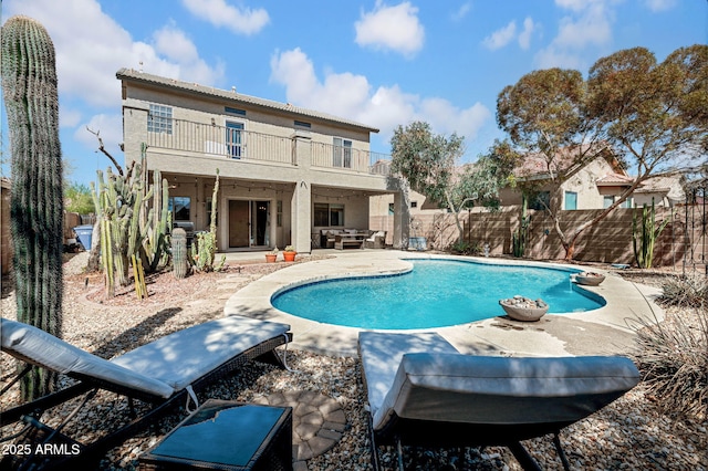 view of pool with a fenced in pool, a patio, and a fenced backyard