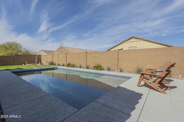 view of swimming pool featuring a patio area, a fenced backyard, and a fenced in pool