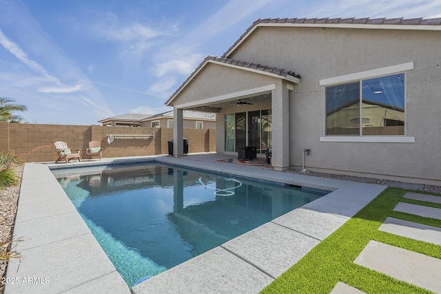 view of swimming pool with a patio, a fenced backyard, and a fenced in pool