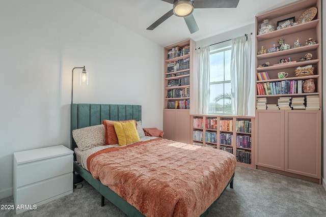 bedroom with ceiling fan and carpet flooring