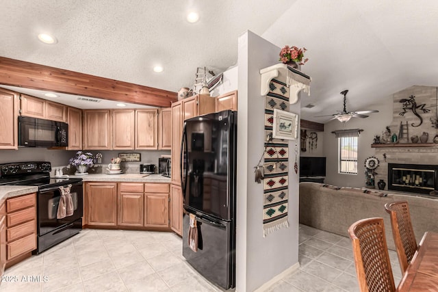 16249 E Stancrest Dr, Fountain Hills, AZ 85268 - kitchen featuring black appliances, lofted ceiling, light countertops, light tile patterned flooring, and recessed lighting