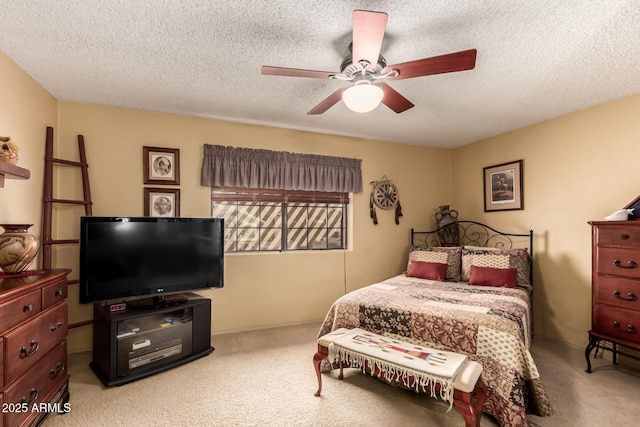 16249 E Stancrest Dr, Fountain Hills, AZ 85268 - bedroom with carpet flooring, a textured ceiling, and a ceiling fan