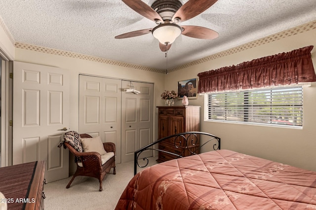 16249 E Stancrest Dr, Fountain Hills, AZ 85268 - carpeted bedroom with a textured ceiling, a closet, and a ceiling fan