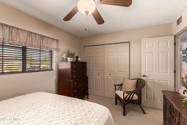 16249 E Stancrest Dr, Fountain Hills, AZ 85268 - bedroom with a closet, light colored carpet, a textured ceiling, and ceiling fan